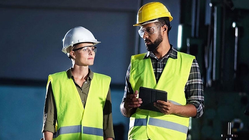 Engineers in a manufacturing facility