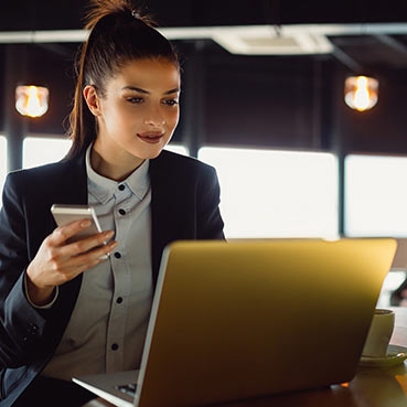 Woman looking at a laptop